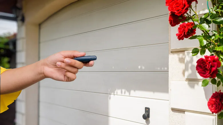 Technician repairing a garage door opener in Buckeye, Arizona
